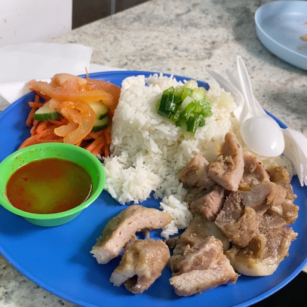 Rice plate with pork and pickles from 88 Foods